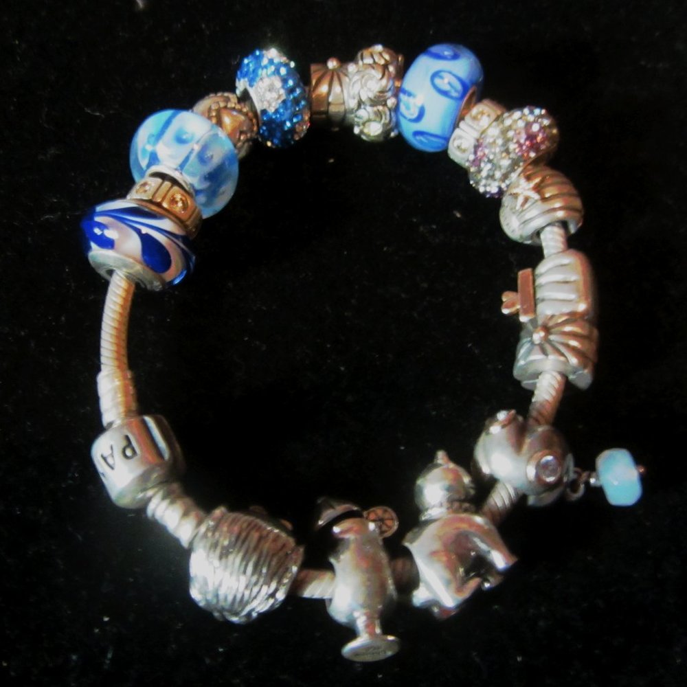 Sterling Silver Pandora Bracelet with accents of 14K Gold